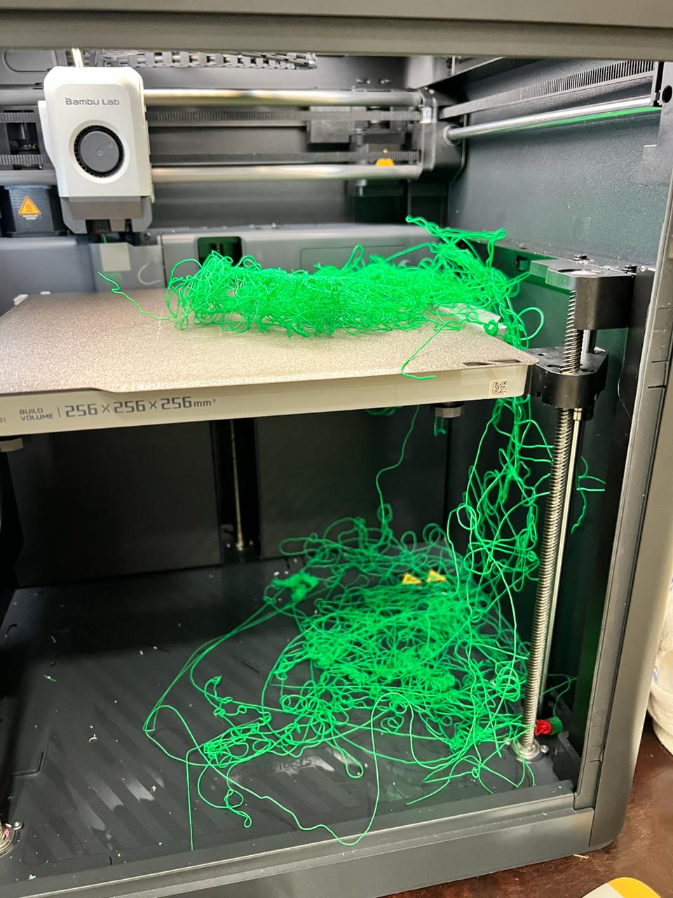Spaghetti failure on a Bambu Lab 3D printer